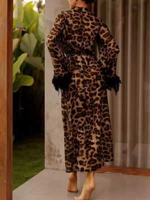 100% polyester Care instructions: Machine wash cold robe in black with relaxed silhouette
