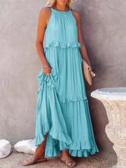 Light blue ruffled maxi dress with smocked bodice and tiered skirt.