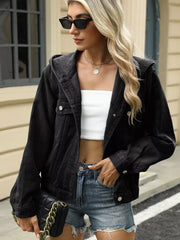 Black hooded denim trucker jacket with chest pockets and button-up front.