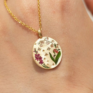 gold necklace with floral and n/a