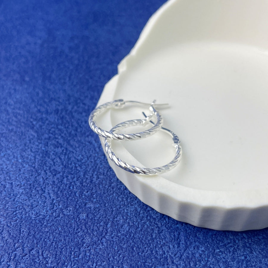 925 sterling silver Care instructions: Avoid wearing during exercise, as sweat w earrings in silver with hoop silhouette