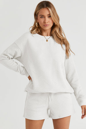 White textured crewneck sweater with long sleeves