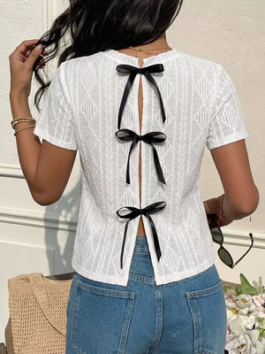 White textured knit t-shirt with crew neck and back bow details