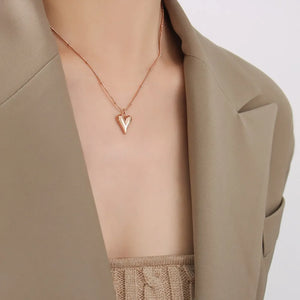 Rose gold heart pendant necklace with beaded chain