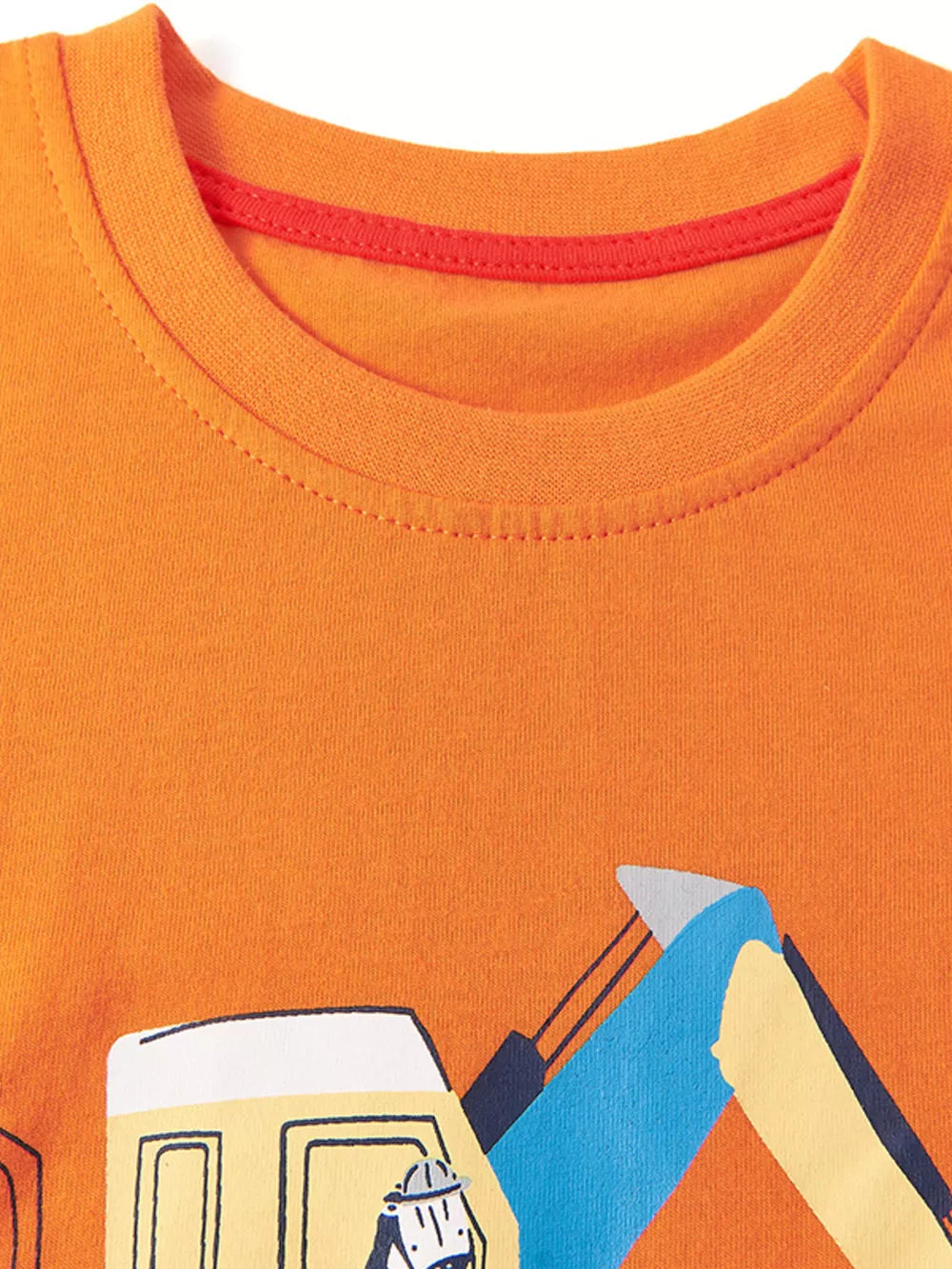 Orange cotton toddler pajama top with excavator graphic and red neckline trim.