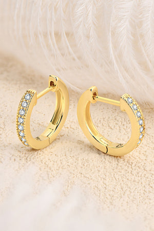 Gold pave-set huggie hoop earrings with clear stones