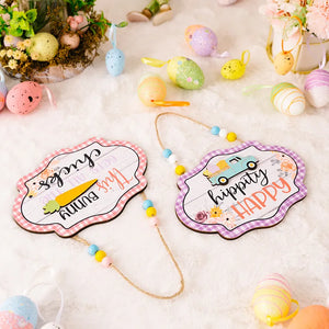 Easter signs with beaded hangers, one pink checkered with carrot, one purple checkered with truck.