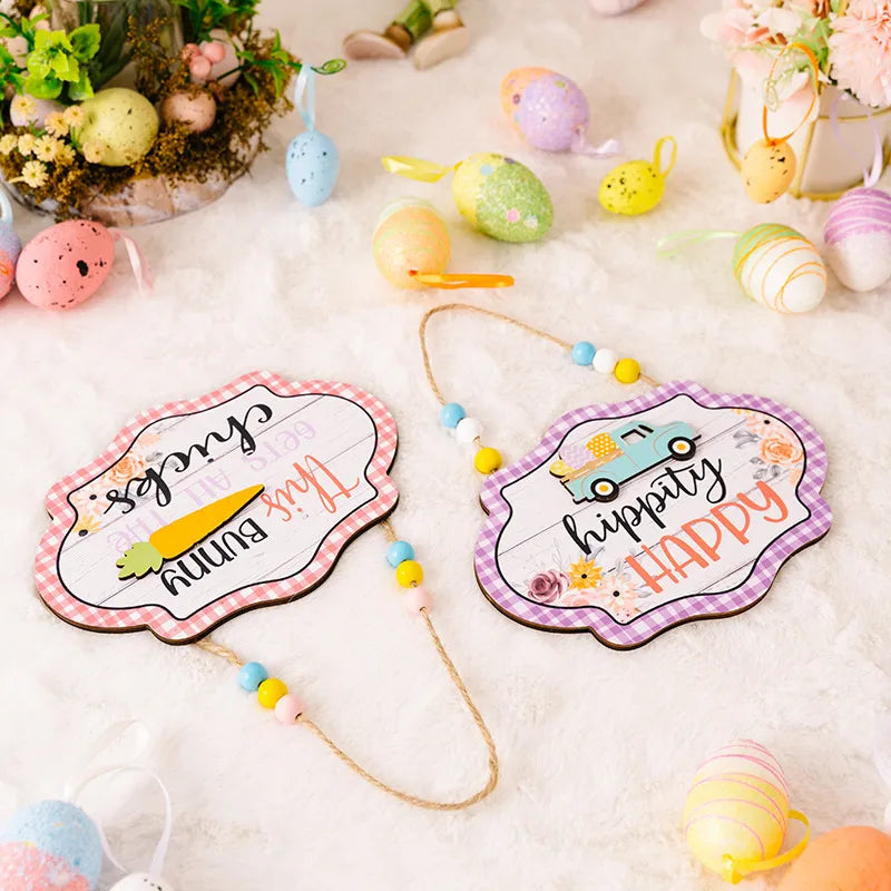 Easter signs with beaded hangers, one pink checkered with carrot, one purple checkered with truck.