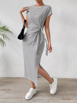 Striped midi dress with tie-side detail and a thigh-high slit.