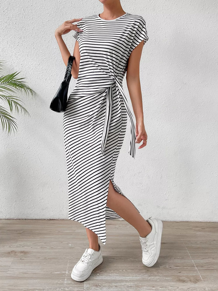 Striped midi dress with tie-side detail and a thigh-high slit.