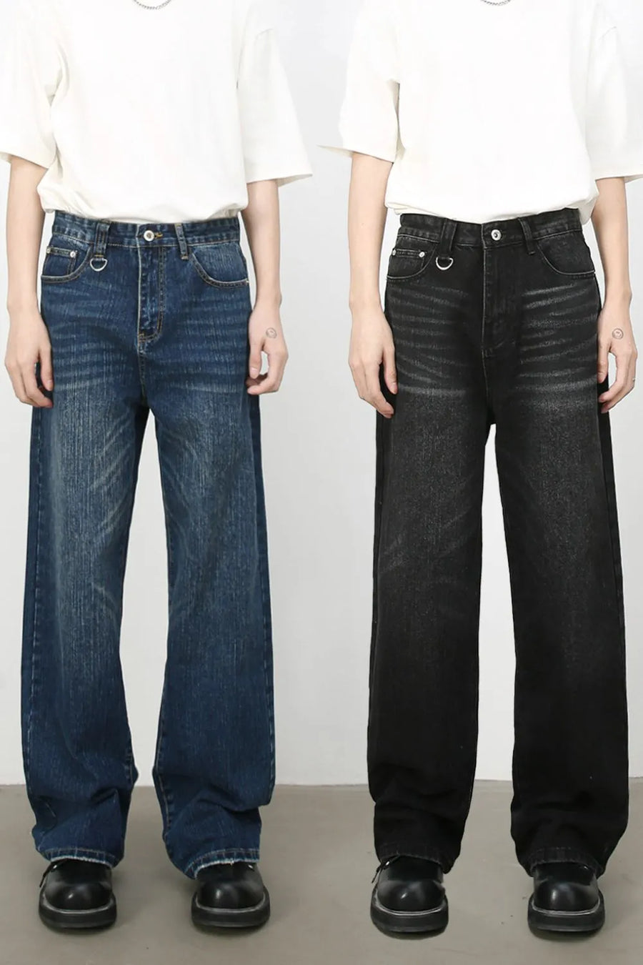 Wide leg distressed denim jeans in medium and dark washes with cat's whisker detail.