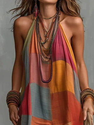 pink jumpsuit featuring halter neck and color-block