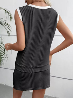 Black ribbed knit sleeveless top and skort set with white trim