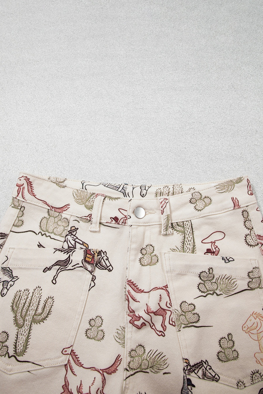 jeans in rust with western print and pocketed
