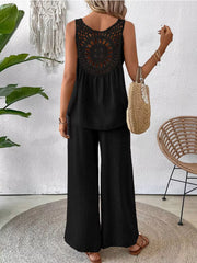 Black lace-detail round neck sleeveless top with wide-leg pants set.