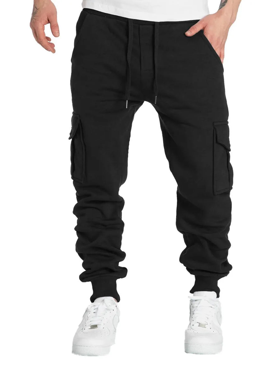 Black cargo joggers with cuffed ankles and drawstring waist.