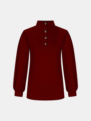 Burgundy mock neck top with button back detail and puff sleeves.