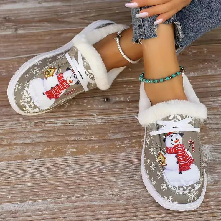 Snowman print faux-fur lined loafers in khaki with white trim and laces.