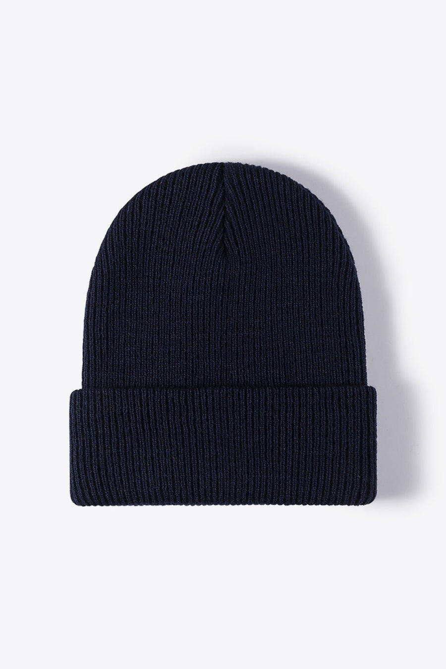 Navy ribbed knit beanie with a cuffed brim.