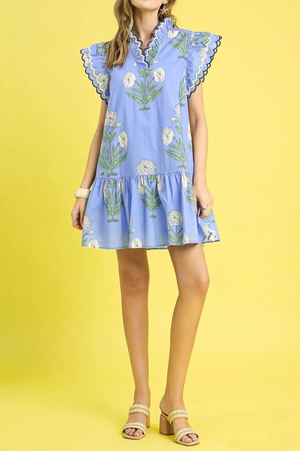 Blue floral ruffle sleeve mini dress with scalloped neckline and tiered hem.