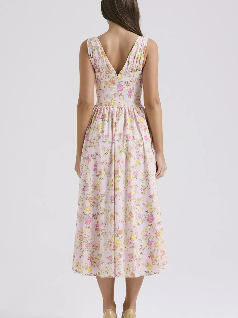 Floral print midi dress in pink with a V-neck and a-line skirt.