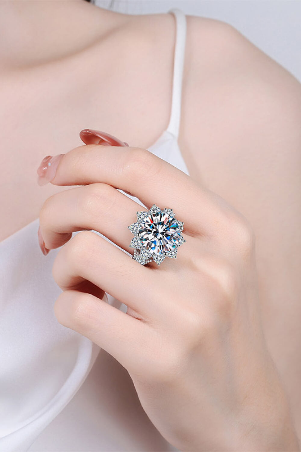 Celestial Burst Moissanite Cocktail Ring in silver sterling silver with a large center stone and halo.