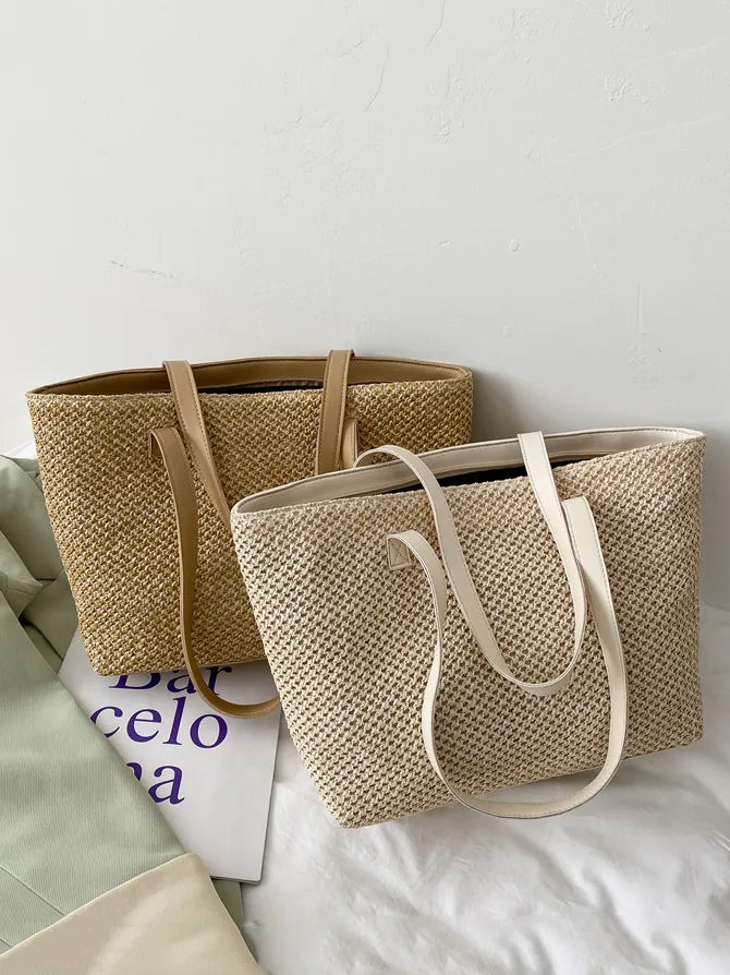 Textured straw shopper bags in beige and khaki with leather straps