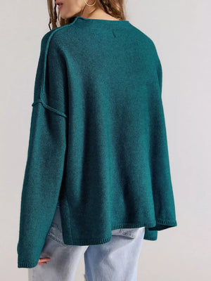 Apricot mock neck sweater with exposed seam and long sleeve