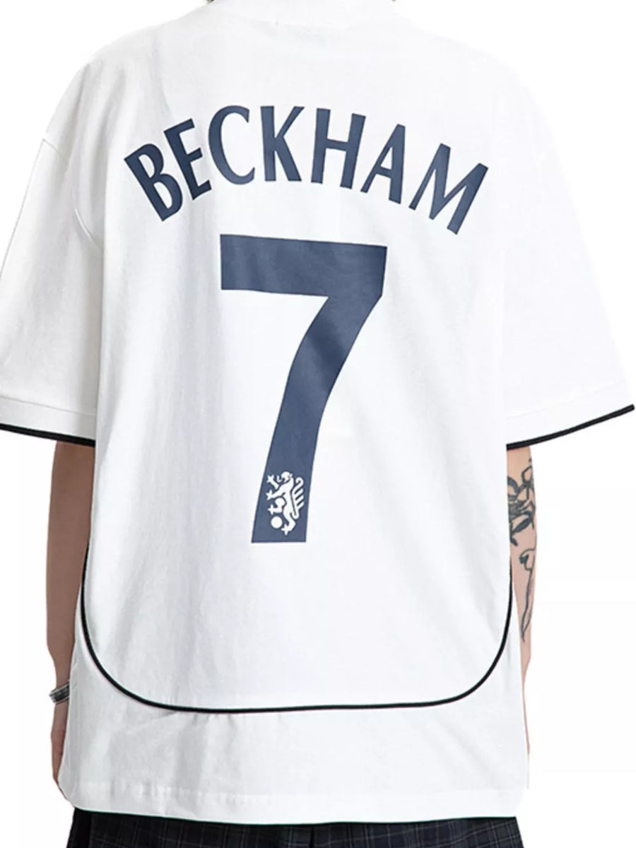 Men's white cotton tee with contrast trim, featuring "BECKHAM 7" graphic and emblem.
