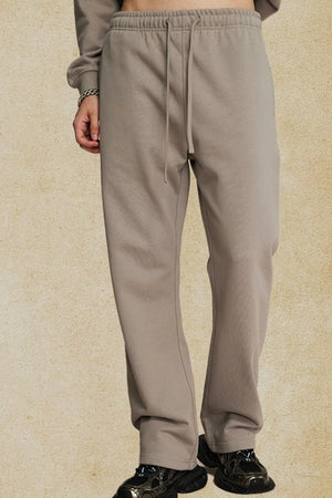 Relaxed fit joggers in Tan with drawstring waist and cuffed ankles.