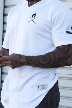 White baseball jersey with graphic detail on chest and sleeve, button front.