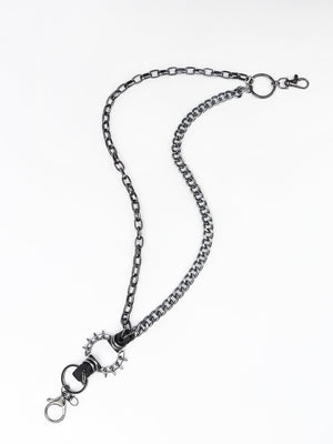 Black spiked chain harness belt with aluminium hardware and lobster clasps.
