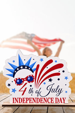 Patriotic Americana wooden tabletop decor with fireworks, stars, and 4th of July Independence Day text.