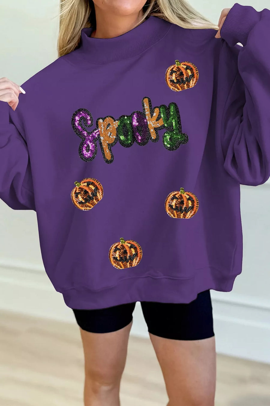 sweatshirt in purple featuring sequin embellishment and relaxed fit