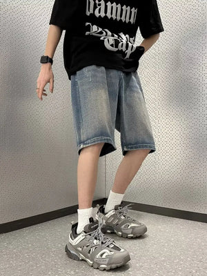 Men's vintage wash stretch denim shorts in light blue, casual relaxed fit.