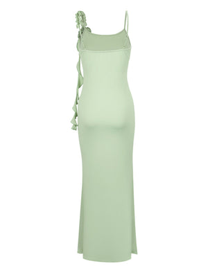 Light green ruffled mermaid maxi dress with spaghetti straps and a bodycon fit.