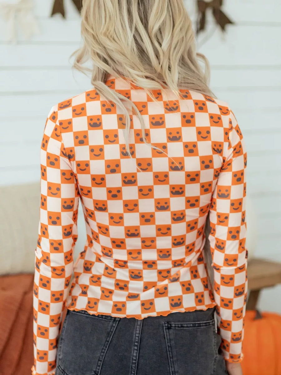 cream blouse featuring mesh and checked