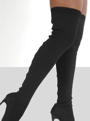Black knit over-the-knee stiletto booties with ribbed top detail.