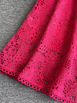 Fuchsia pink lace A-line dress with floral pattern and cutout detail.