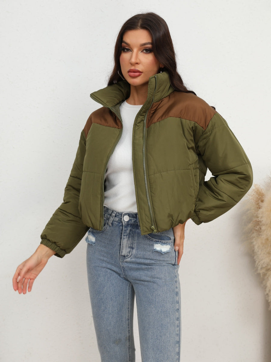 Colorblock cropped puffer jacket in army green with brown accents, full zip and stand collar.
