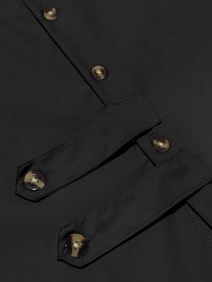 Black long-sleeve men's cotton button-down shirt with decorative buttoned tabs.
