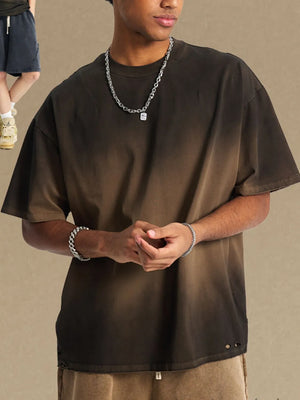 Oversized tee with faded ombre pattern in dark brown and black, crew neck, short sleeves.