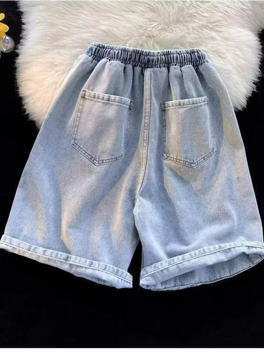 Men's light wash relaxed fit denim shorts with elastic waistband and back pockets.
