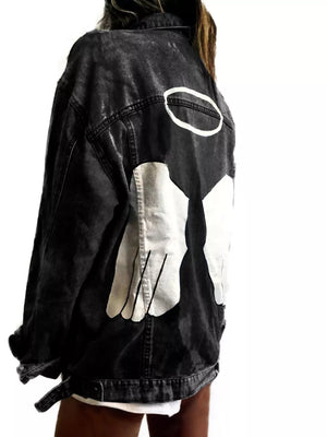 white denim jacket featuring oversized and graphic print