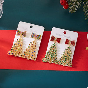 earrings in Gold with novelty and rhinestone embellishment