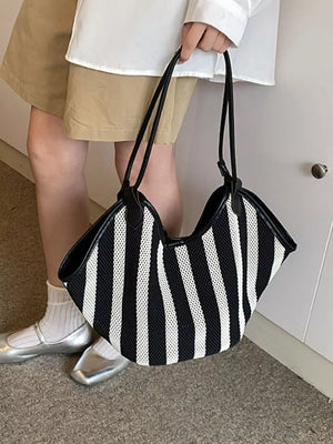 handbag in black featuring knit texture and relaxed fit