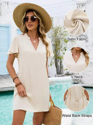 Beige satin mini dress with V-neck, flutter sleeves, and waist tie.