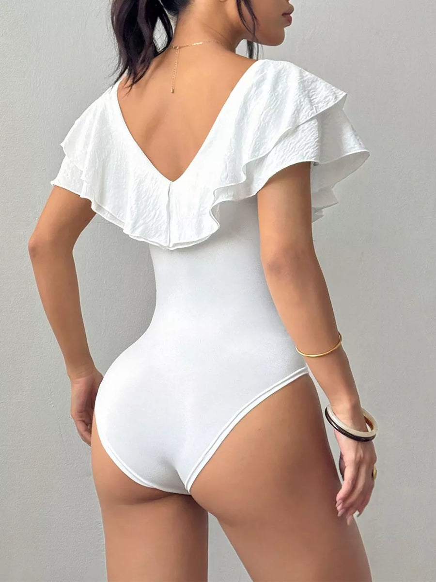 Black bodysuit with stretch and cap sleeve