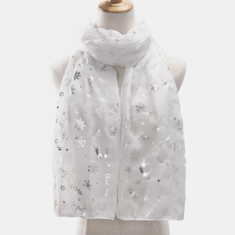 White Christmas print metallic scarf with snowflakes and reindeer.