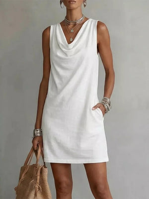 White sleeveless cowl neck mini dress with pockets